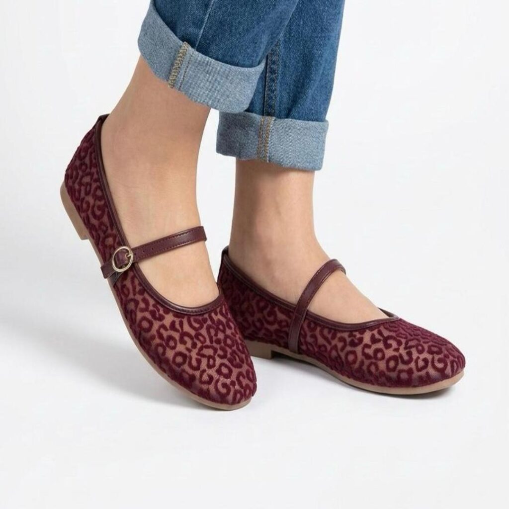 Garnet Mary Jane flats with a synthetic