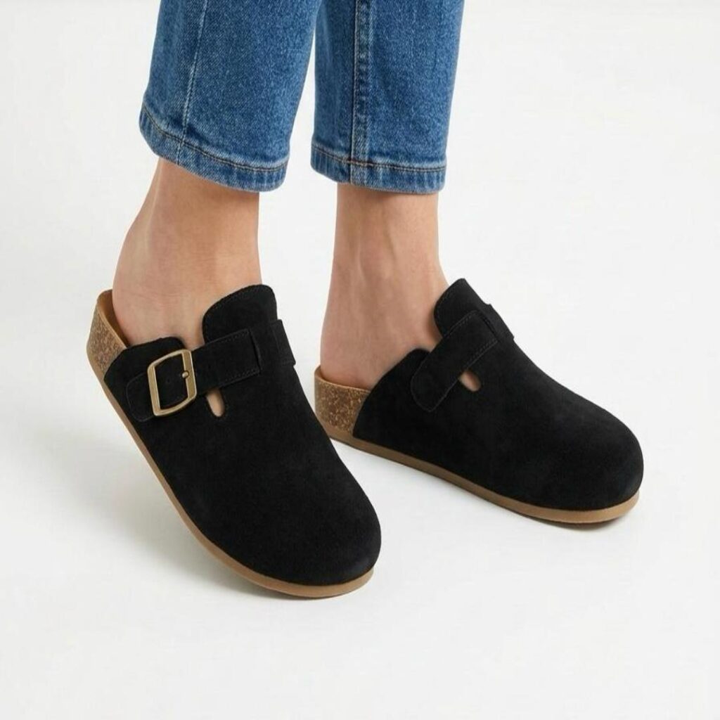 Faux suede buckle clogs with a cork footbed