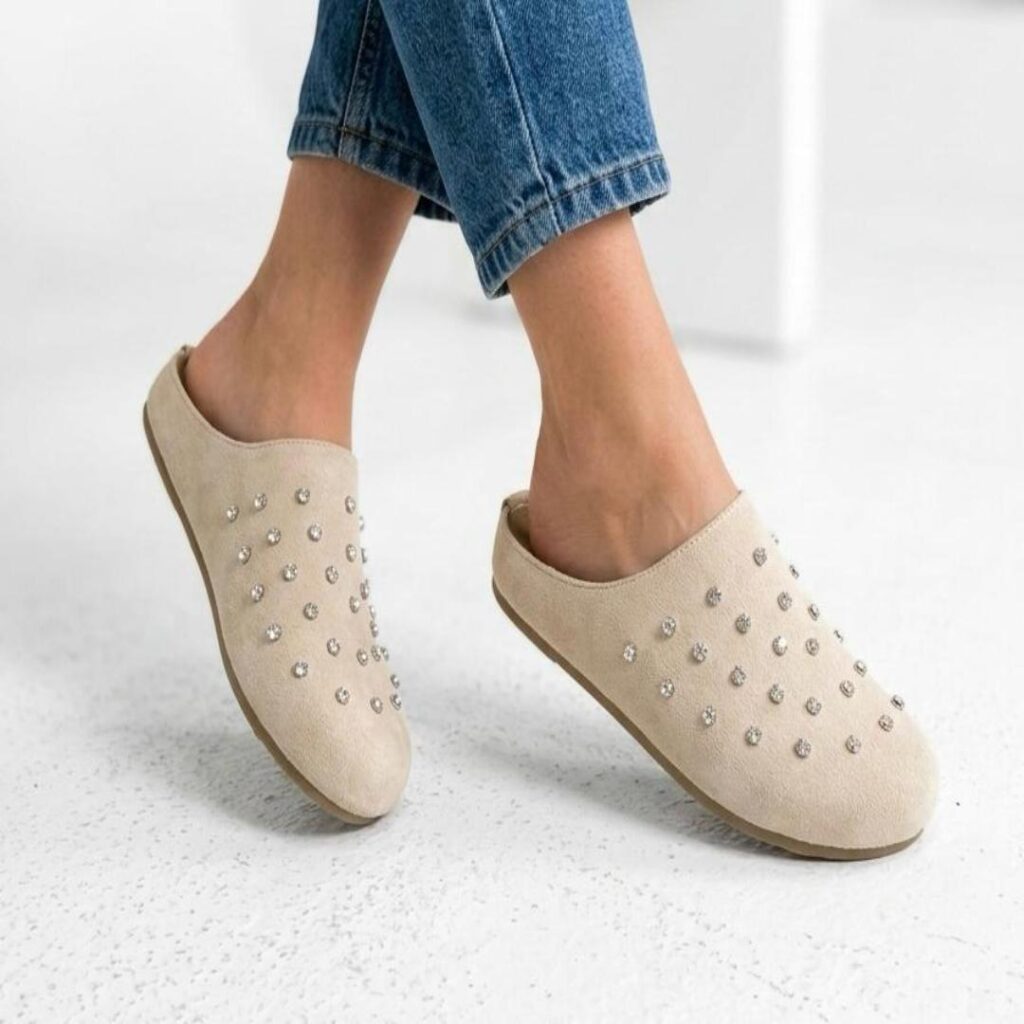 Slipper suede mules adorned with small silver studs